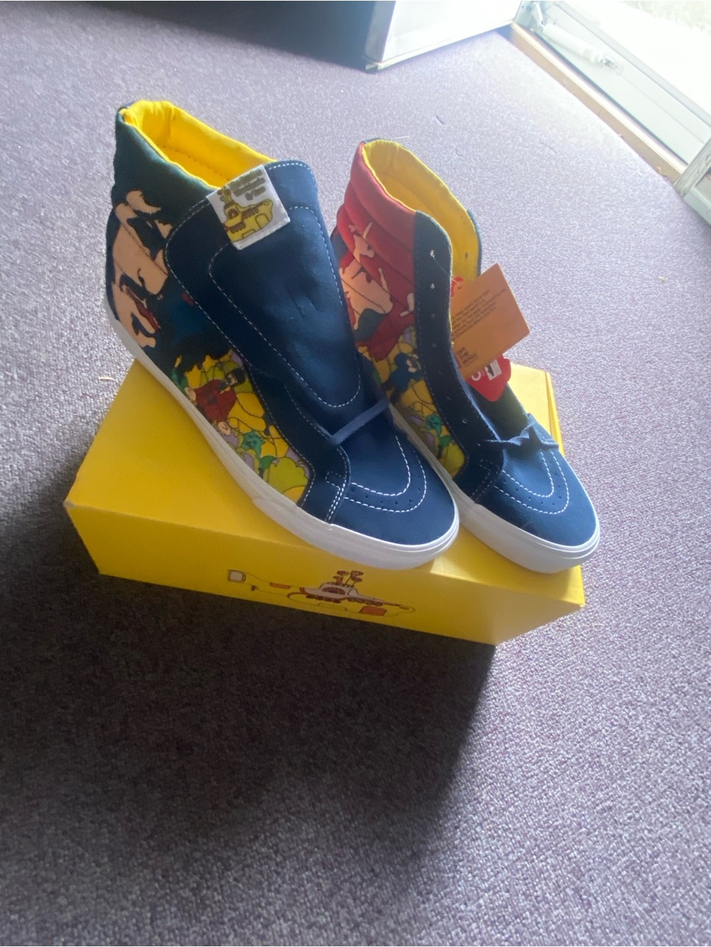 Vans Navy Blue High-Top Sneakers with Yellow Lining and Multi-Color Side Art
